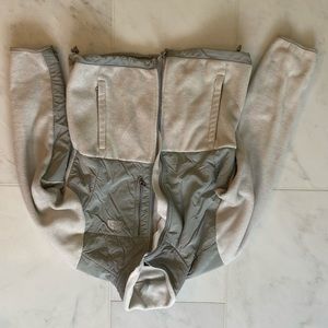 white and grey classic north face zip up